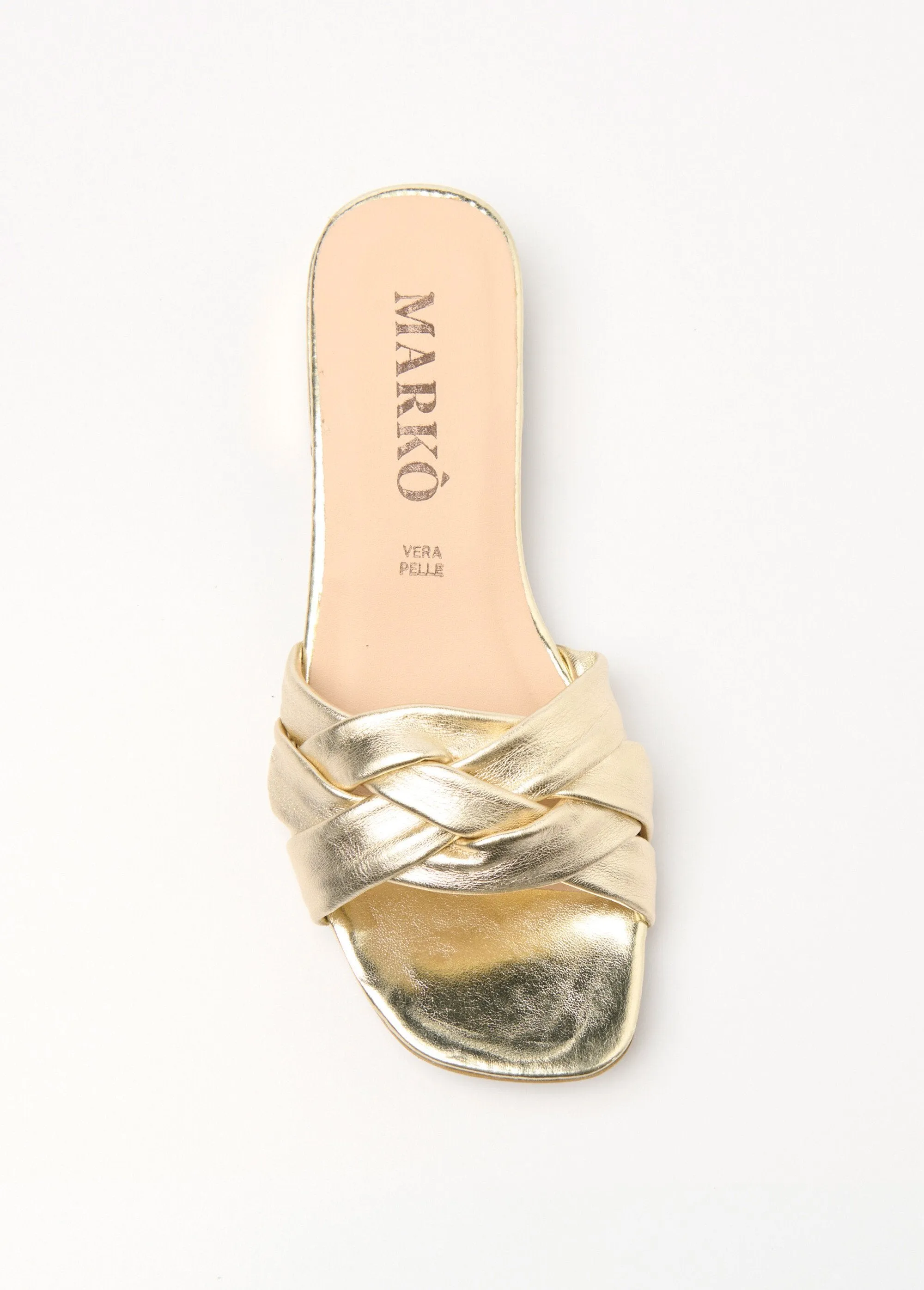 Leather mules with fancy interlaced straps